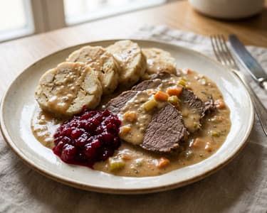 Old Viennese Sauerbraten | Tenderly braised in root vegetable stock & cream sauce