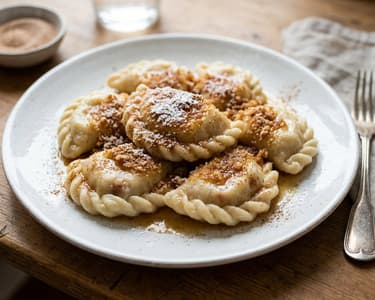 Carinthian Apple Dumplings with Cinnamon-Breadcrumb Butter