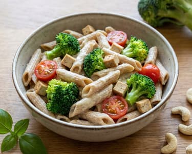 Whole wheat pasta with creamy cashew sauce and broccoli