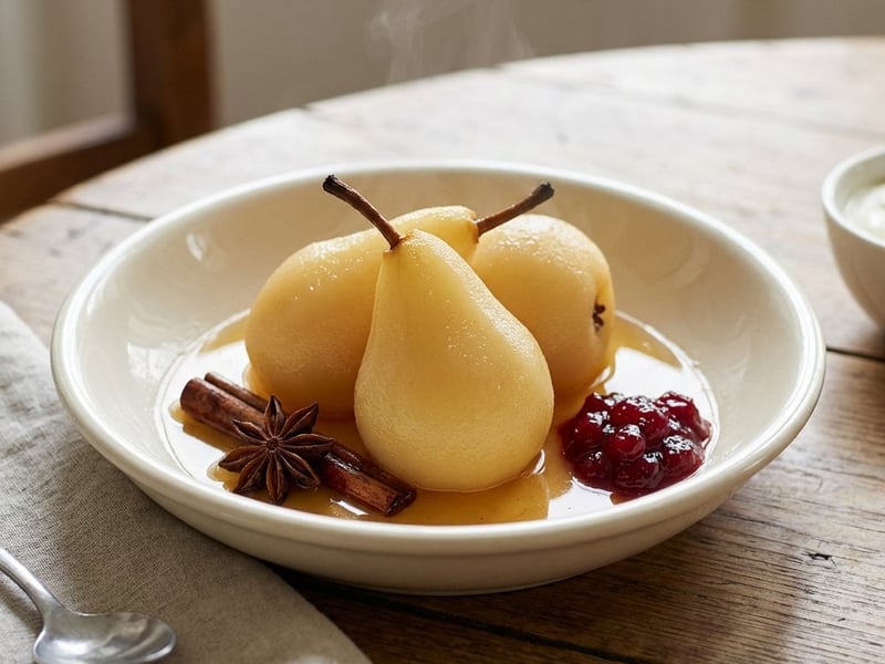 Pears poached in white wine with spices