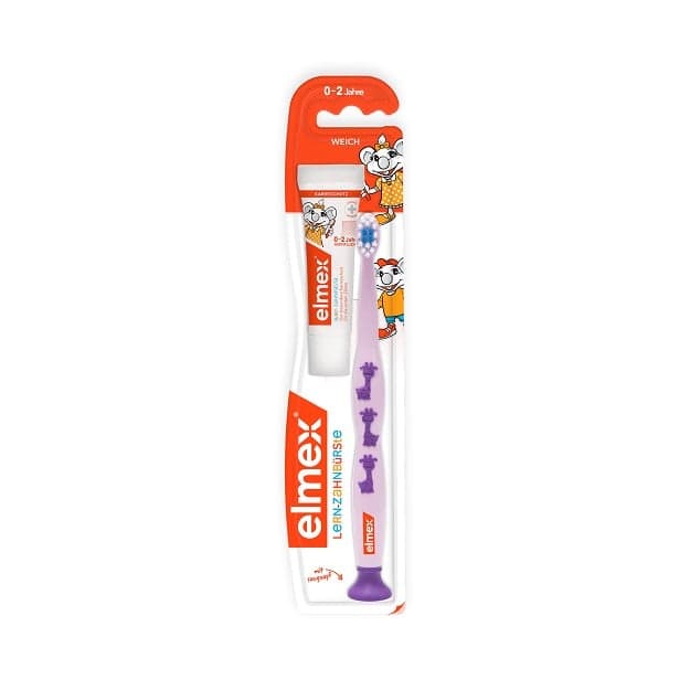 elmex® Lernzahnbürste (gelb, blau od. lila) 0-2 Jahre + 12ml Zahnpasta